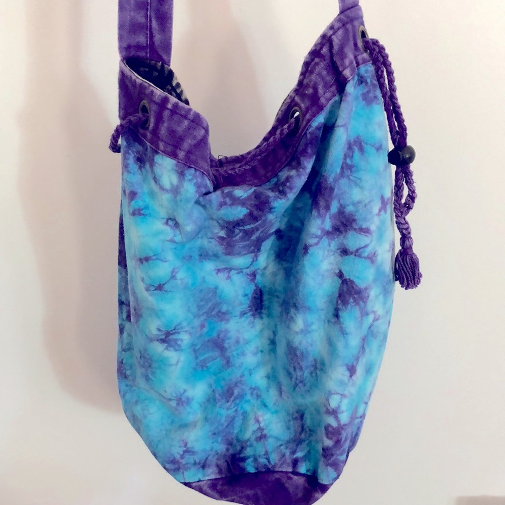 11 1/2” x 13” x 28” longest for strap fully extend